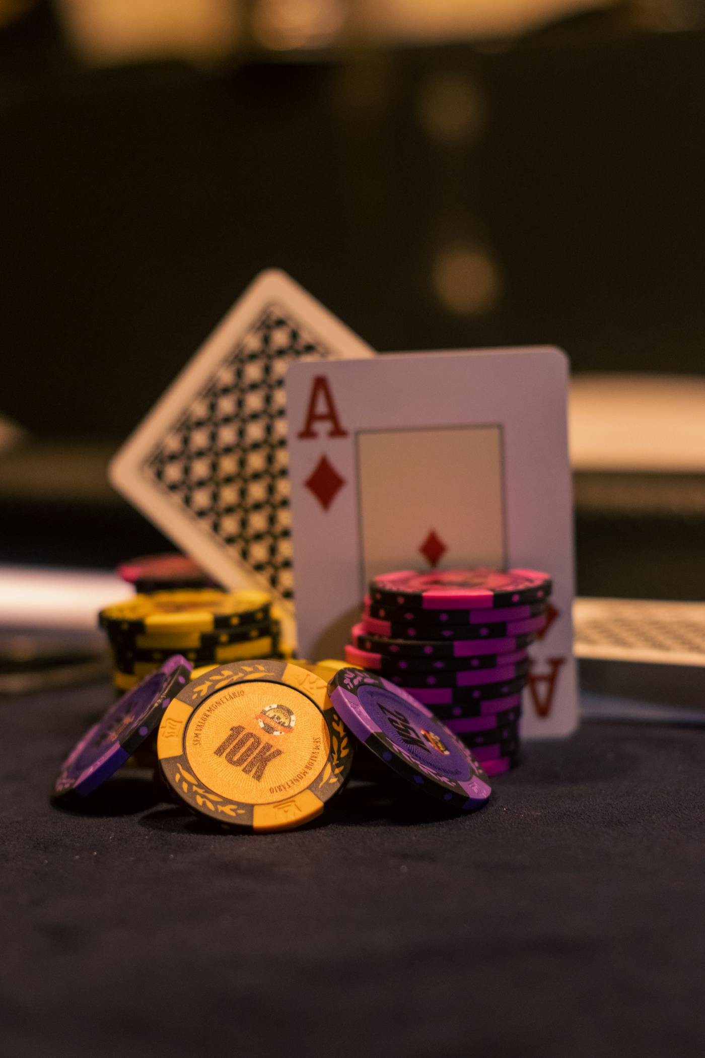 Poker chips and playing cards representing auto cashout planning