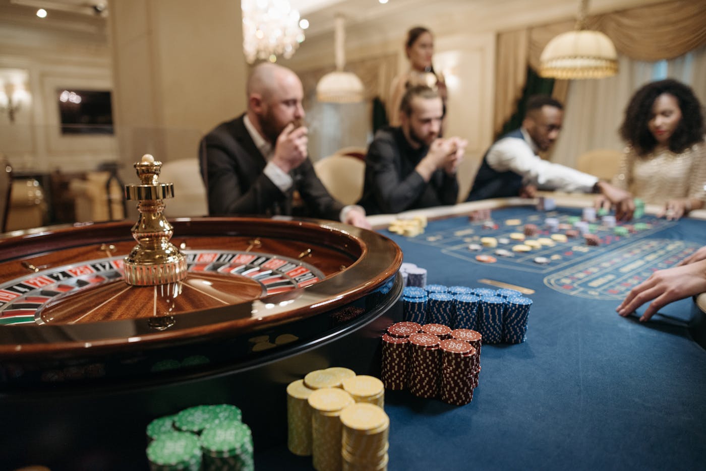 Roulette table and casino chips representing crash game risk and timing