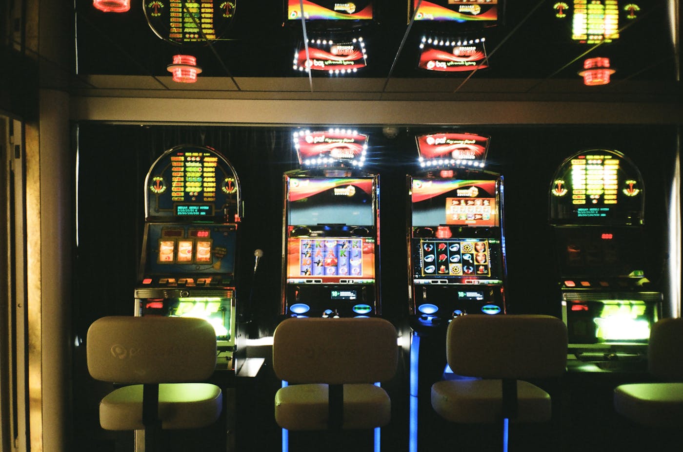 Slot machines in a casino representing bankroll and risk management